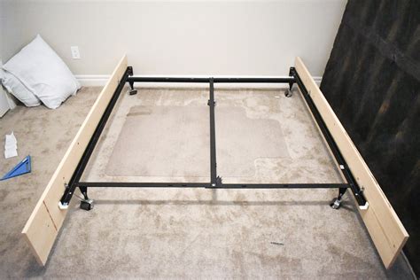 wood box around metal bedframe|metal bed frame cover up.